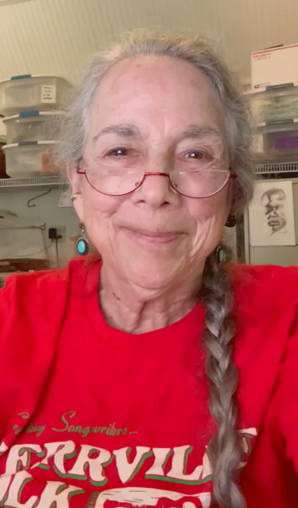 Crow in her Kerrville Folk Festival t-shirt
